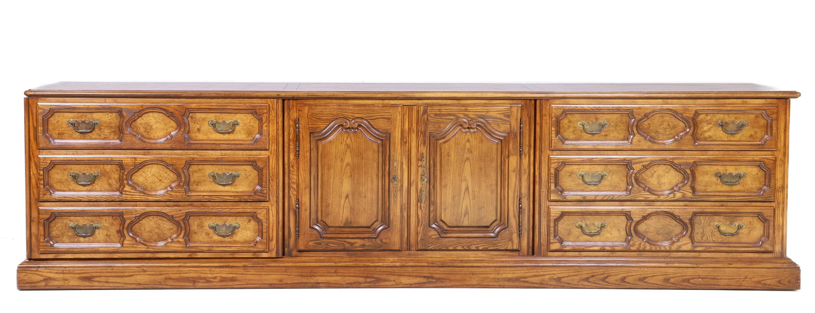 (5) part oak sideboard: (5) part oak sideboard, center section with two paneled doors flanked by three drawer chests, 30"h x 115"w x 19"d