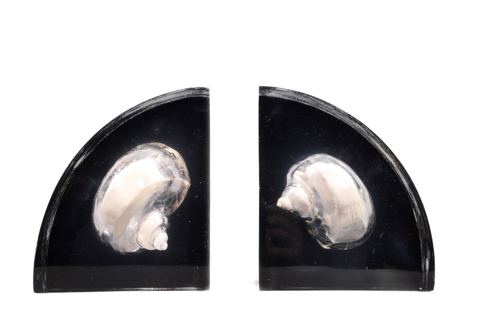 Pair of Lucite Seashell Bookends: Pair of lucite seashell bookends, unmarked, 5-3/8" x 3-5/8" x 6-3/8" h