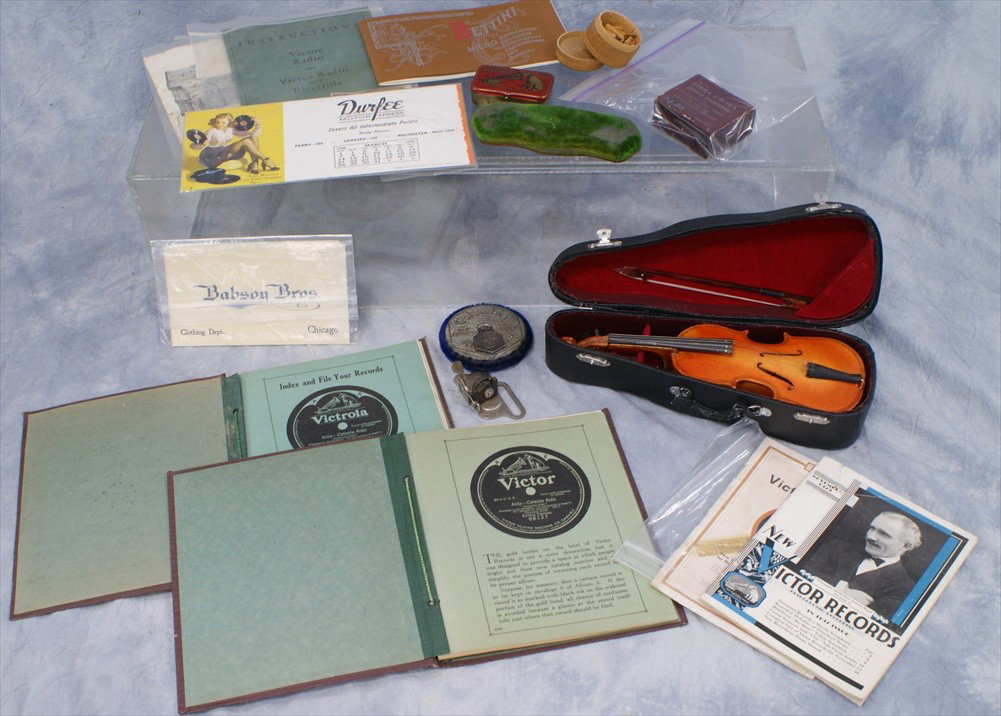 Lot of phonograph ephemera including Victor Radio : Lot of phonograph ephemera including Victor Radio instruction book, 2 packs Victor needles, 1948 blotter, 2 Babson Bros order envelopes, 2 Edison Amberola record catalogs, 2 Victor record catalogs, re