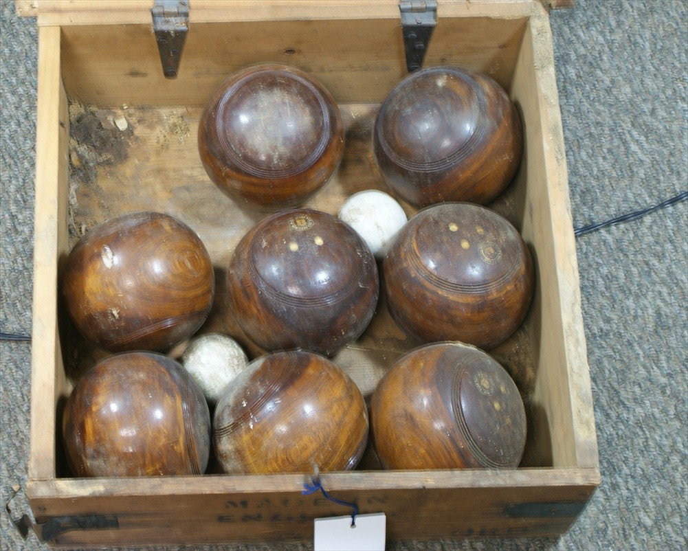 8 large and 2 small English lawn bowling balls in : 8 large and 2 small English lawn bowling balls in original crate, from Alex Taylor, London
