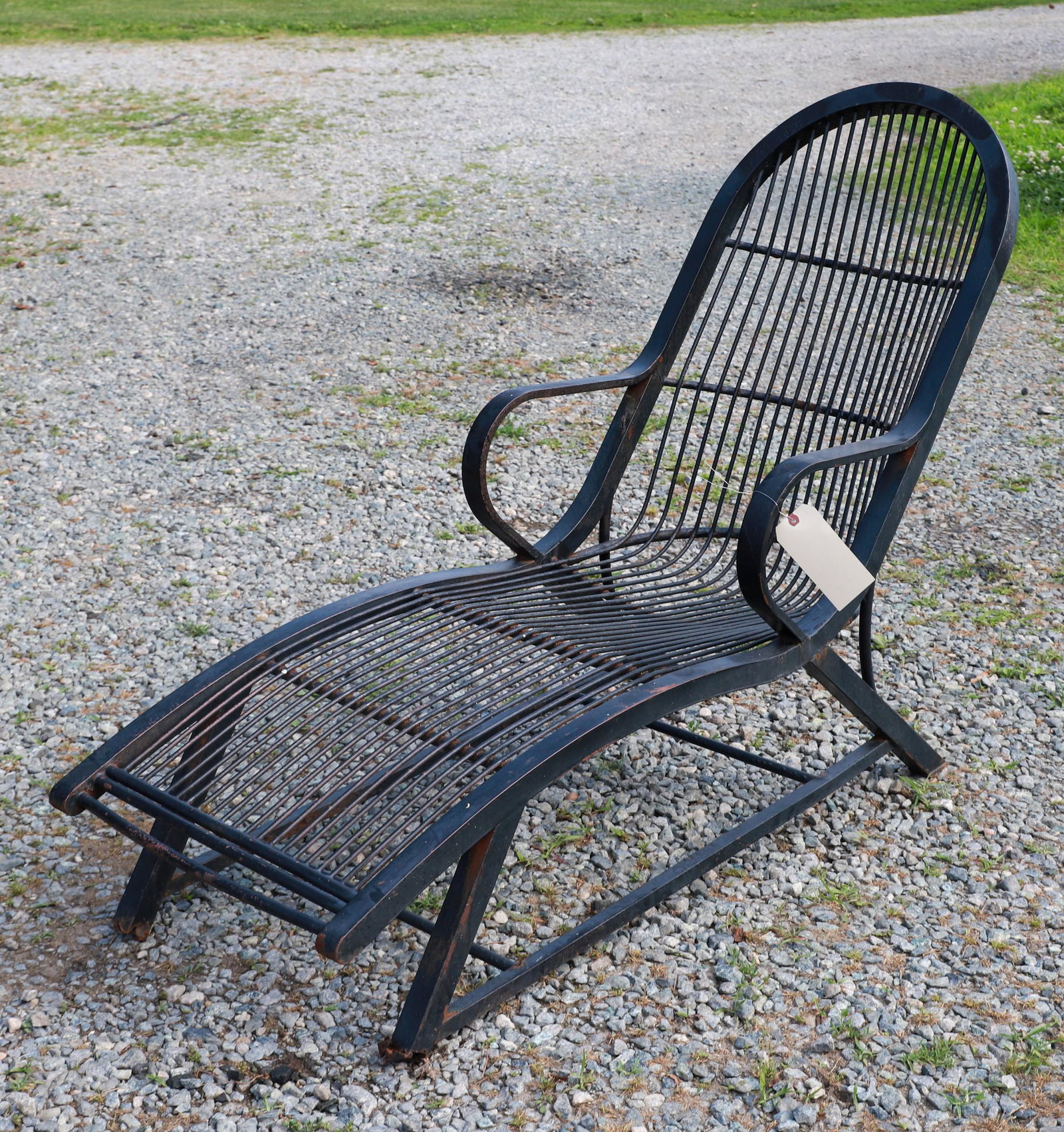 Trudo ebonized metal chaise lounge: Trudo Everlasting Comfort ebonized metal chaise lounge, bent metal posts, 39"h x 56"w x 22"d