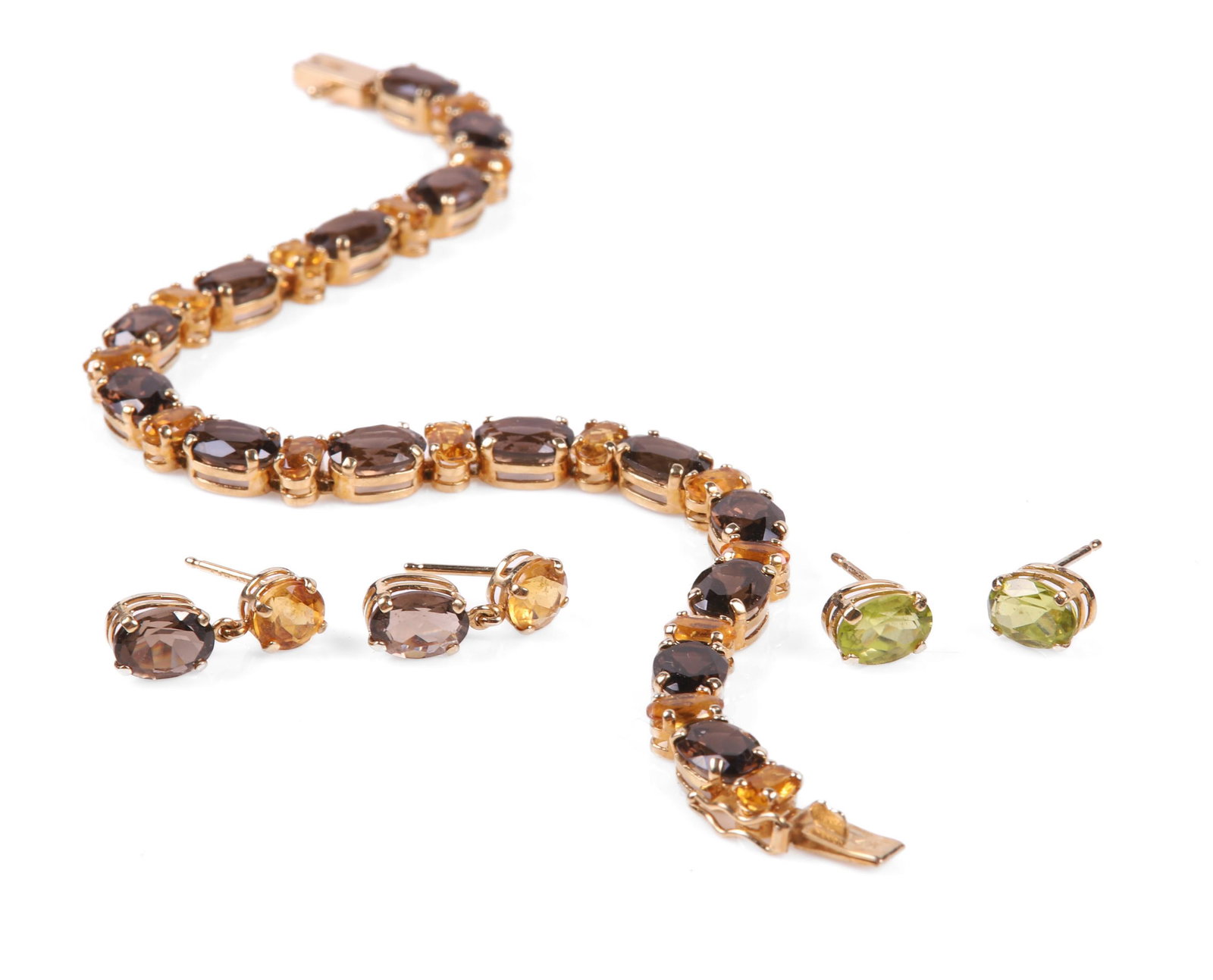 (3) 14K YG Tennis Bracelet and Earrings: (3) 14K YG Tennis Bracelet and earrings to include brown and citrine colored bracelet, 7"L, matched earrings and similarly designed post earrings in peridot type stone.
