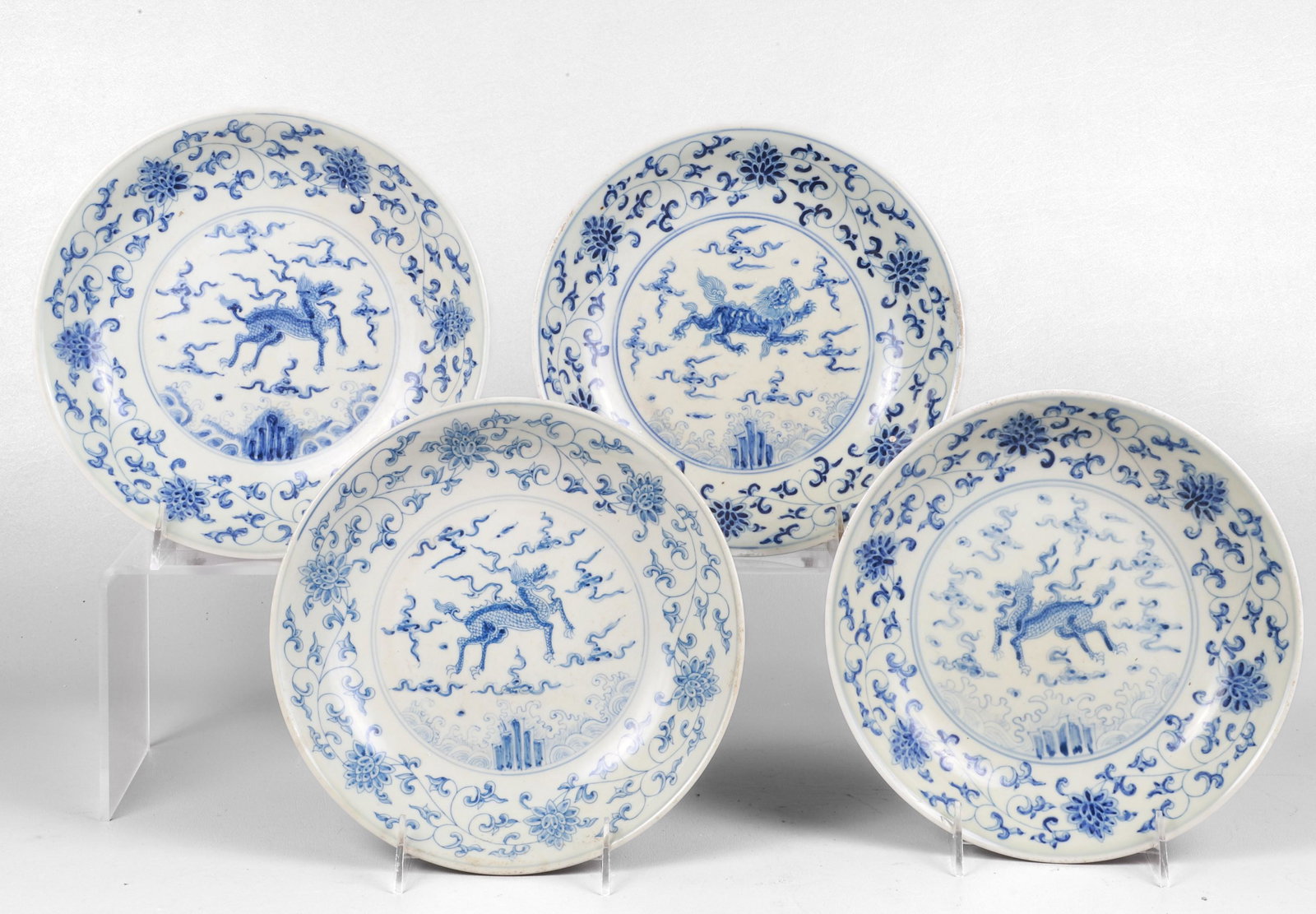 (4) Chinese Blue & White Porcelain Shallow Bowls: (4) Chinese blue and white porcelain shallow bowls, dragon decoration, 6-character mark to base, 8-3/4" dia x 2" h