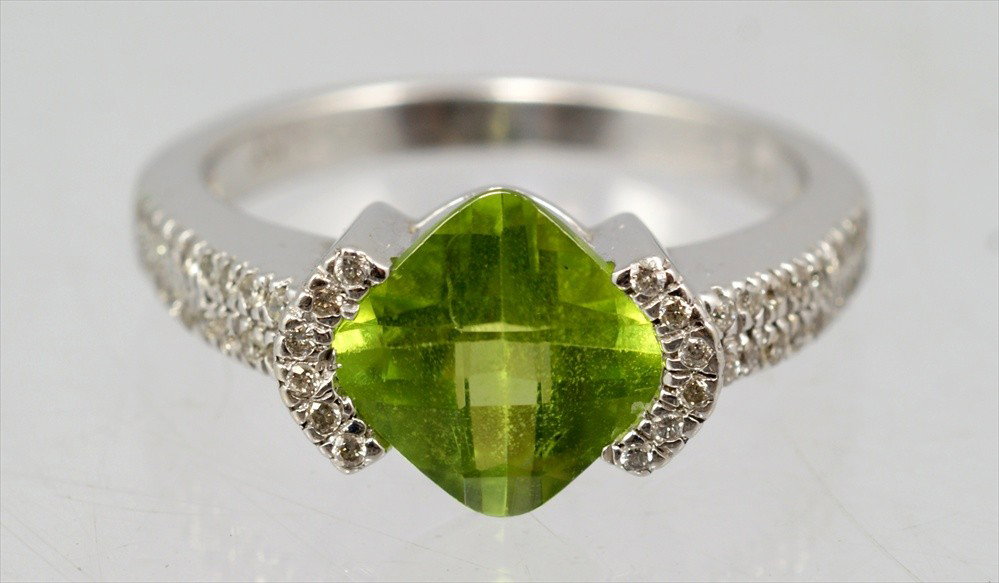 14K WG peridot and diamond ring, 8 mm square center: 14K WG peridot and diamond ring, 8 mm square center stone with 50 small diamonds flanking and on shank, size 8, 3.5 dwt