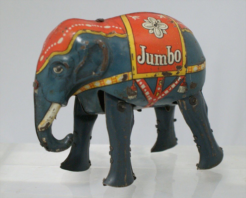 "Jumbo" Tin Wind up Elephant Toy, Made in Germany,: "Jumbo" Tin Wind up Elephant Toy, Made in Germany, DRP and DRGM, 3-1/2" h, minor wear.