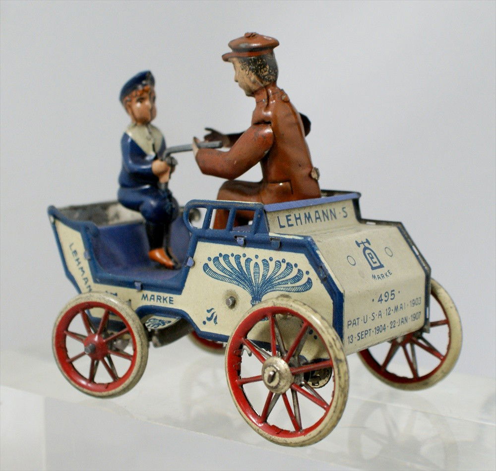Lehmann's Marke Toy Tin Wind Up Car, #495, 4-1/4": Lehmann's Marke Toy Tin Wind Up Car, #495, The Naughty Boy, 4-1/4" h, 5" l, working.