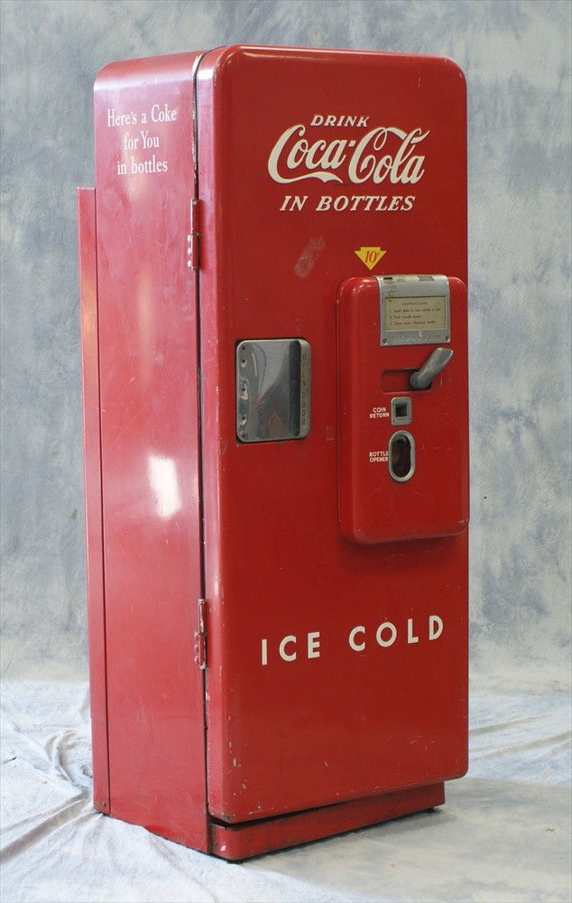 Coca Cola Standing Bottle Dispenser, 1950's, Mode: Coca Cola Standing Bottle Dispenser, 1950's, Model 651-A, Serial # 236928, "Here's a Coke for you in bottles", Cavalier Corporation Appliance Division, Chattanooga, Tenn, 64-1/2" h, 24-3/4" w, 25" d,