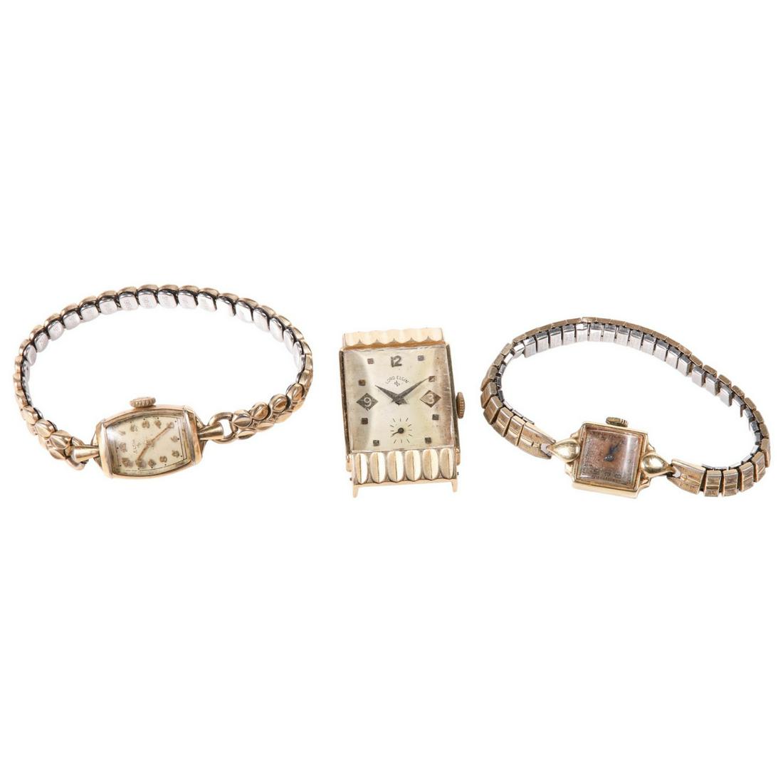 (3) Gold Filled Watches: (3) Gold filled watches to include 10K gold filled Elgin ladies bracelet watch, gold filled Elgin ladies bracelet watch and 14K gold filled Lord Elgin tank watch.