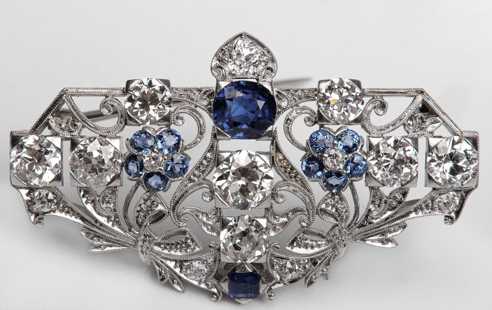 Unmarked white metal diamond brooch (1 of 8)