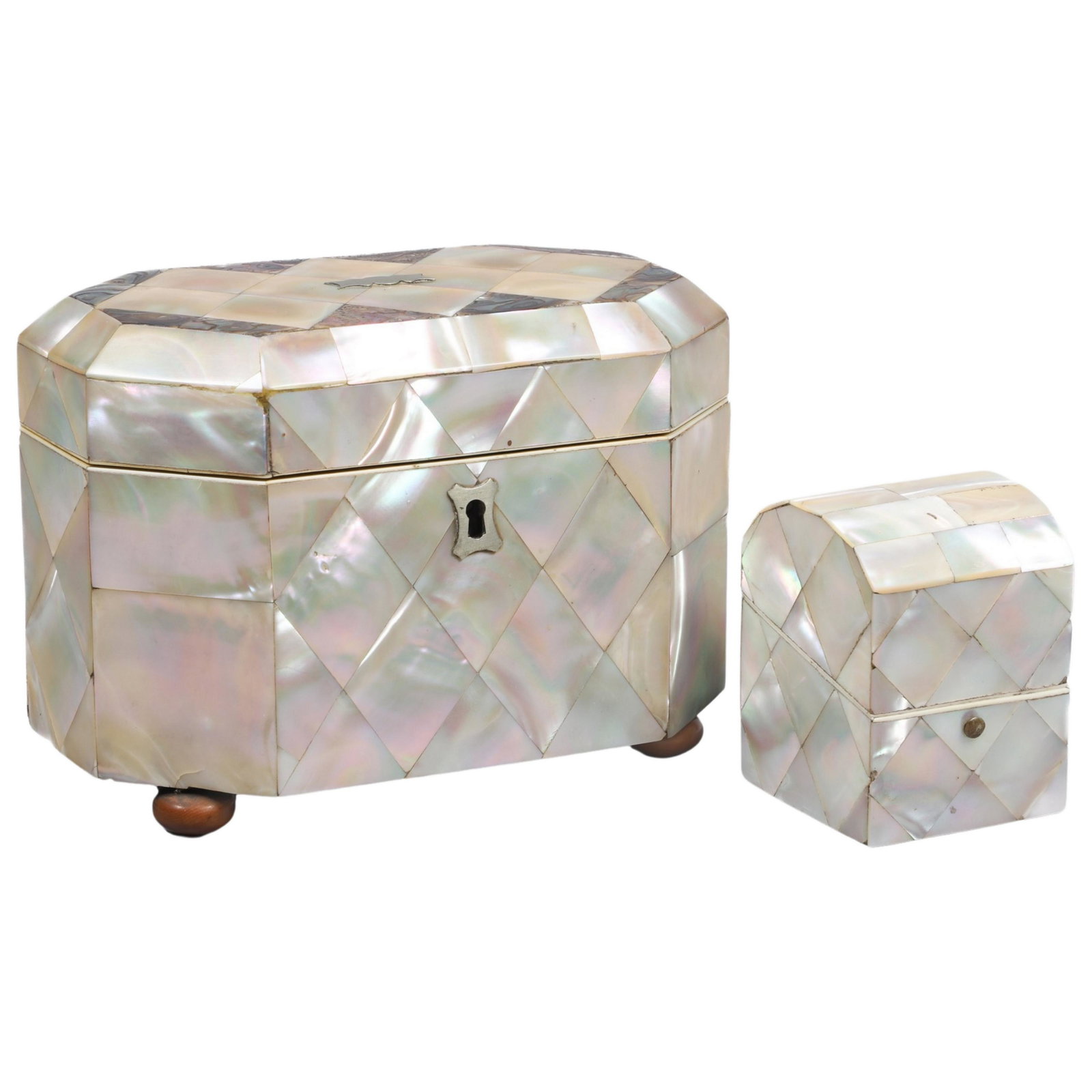 Mother of Pearl Inkwell and Tea Caddy: Mother of pearl inkwell and tea caddy to include MOP tiled dome top box with fitted inkwell,2-3/4"H, 2-1/8"W and octagonal mother of pearl and abalone tiled tea caddy with silver plaque and top, silve