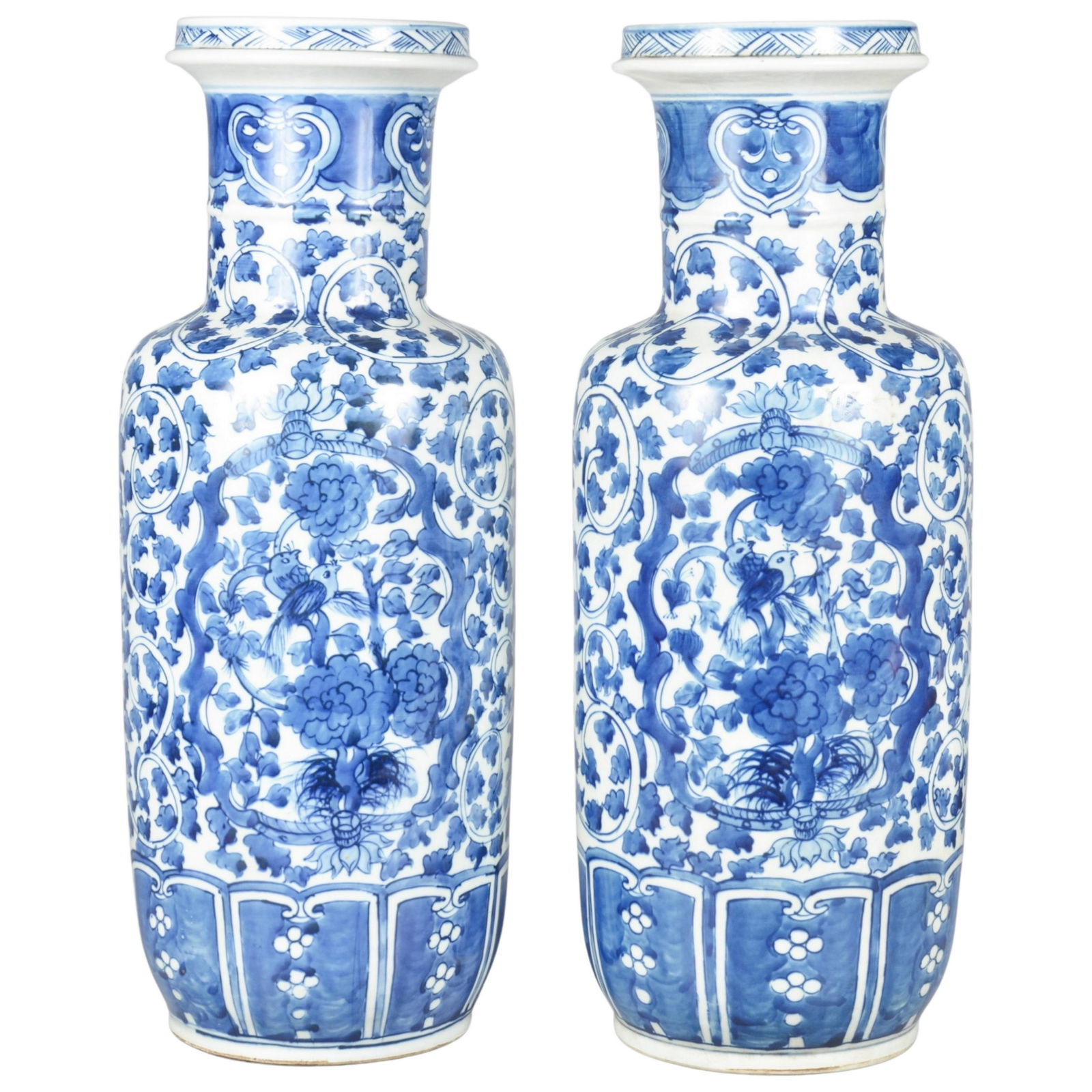 Pr Blue & White Chinese Porcelain Rouleau Vases: Pr Blue & White Chinese Porcelain Rouleau Vases, 6 character Kangxi mark in double blue circles to base. overall vine & floral design, base with 7 shaped panels, body with reserves front and back, bot