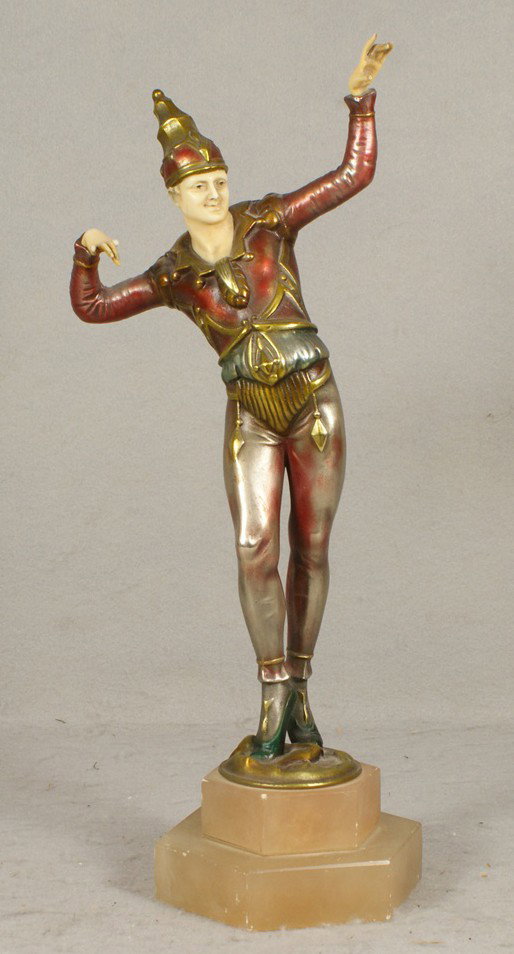 Unsigned art deco patinated white metal sculpture: Unsigned art deco patinated white metal sculpture of a jester with ivorine head and hands (2 broken fingers) on alabaster base, 13 1/2" h