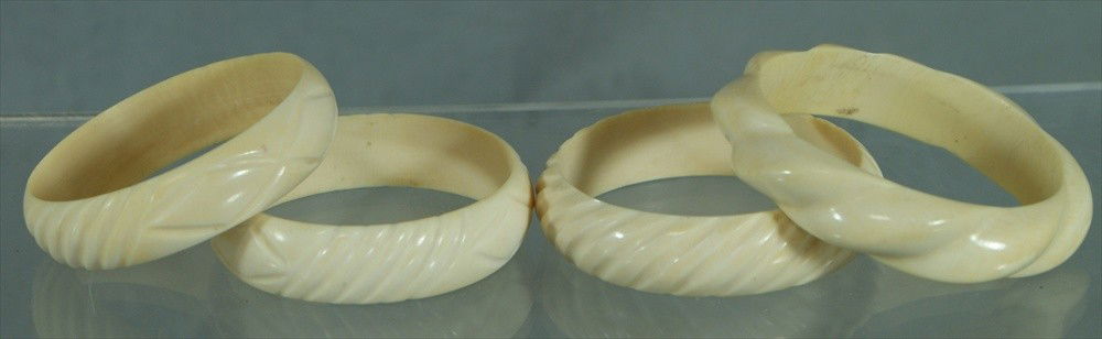 4 carved ivory bangles, 5/8" w, 2 3/8" id: 4 carved ivory bangles, 5/8" w, 2 3/8" id