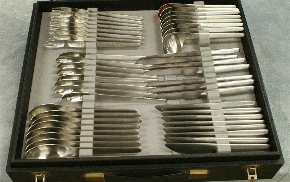 76 pcs stainless steel flatware, mfg by A Michelso: 76 pcs stainless steel flatware, mfg by A Michelson, designed by Arne Jacobsen, in original case, s/8 with brochures