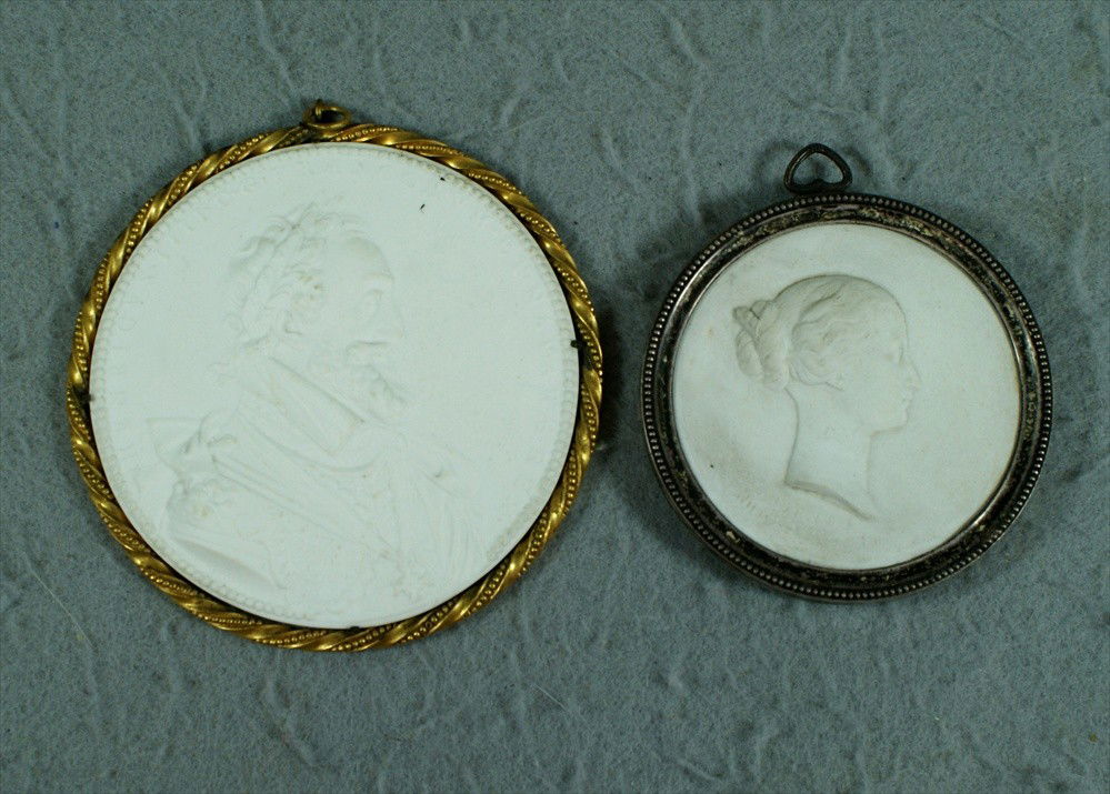 (2) Round Parian portrait discs, one depicting Hen: (2) Round Parian portrait discs, one depicting Henry IV, King of France 1589-1610, 4 1/4" dia in a twisted brass bezel mount, with a profile bust portrait of an unknown woman, marked "S.67" verso, in