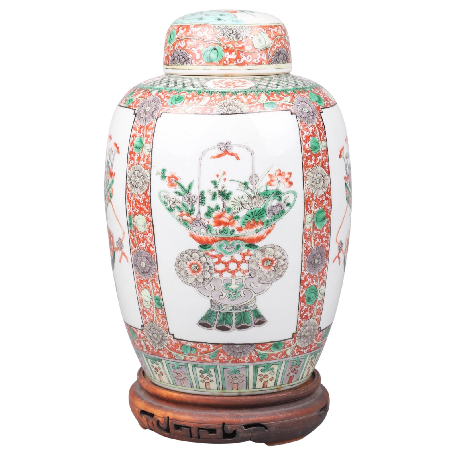 Chinese Porcelain Covered Jar: Chinese porcelain covered jar, basket of flowers decoration, unmarked, 12Ã¯Â¿½ h, on carved wood stand