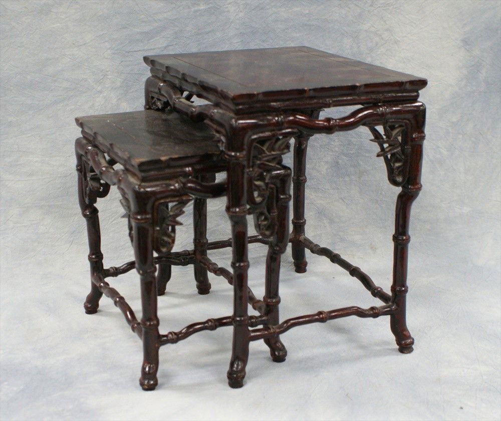 Nest of two carved teakwood tables, late 20th C,: Nest of two carved teakwood tables, late 20th C, largest 10" h x 9" w x 7" d