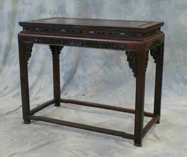 Finely carved Chinese teakwood table, 32" h x 38: Finely carved Chinese teakwood table, 32" h x 38-1/2" l x 19-1/2" d, 19th century or earlier