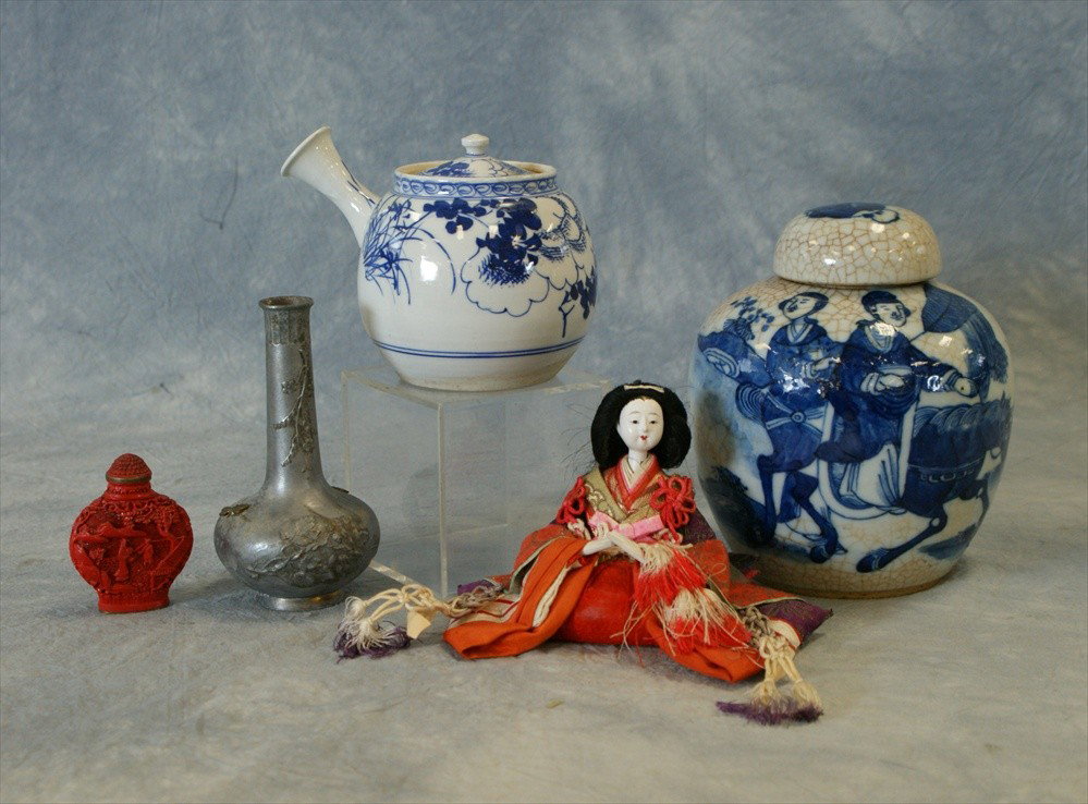 Assorted lot of Asian items, to include a Chines: Assorted lot of Asian items, to include a Chinese blue and white ginger jar, a Japanese wine pot, a Japanese pewter vase, a Hina doll, and a cinnabar lacquered snuff bottle, 19-20th century