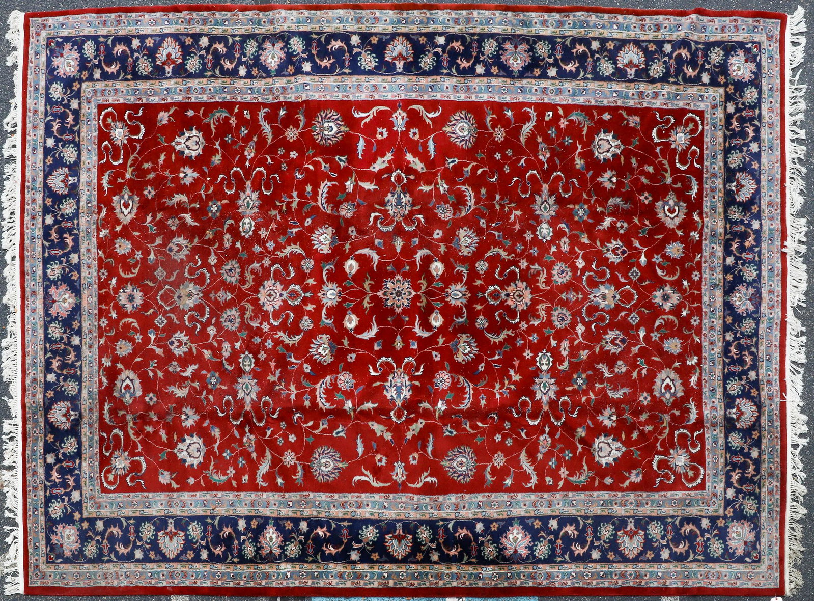 9'11" X 13'10" Indo Naine Rug: 9'11" X 13'10" Indo Naine Rug, circa 1970, artificial fringe, stains, fading, please see photos for any specific condition concerns.