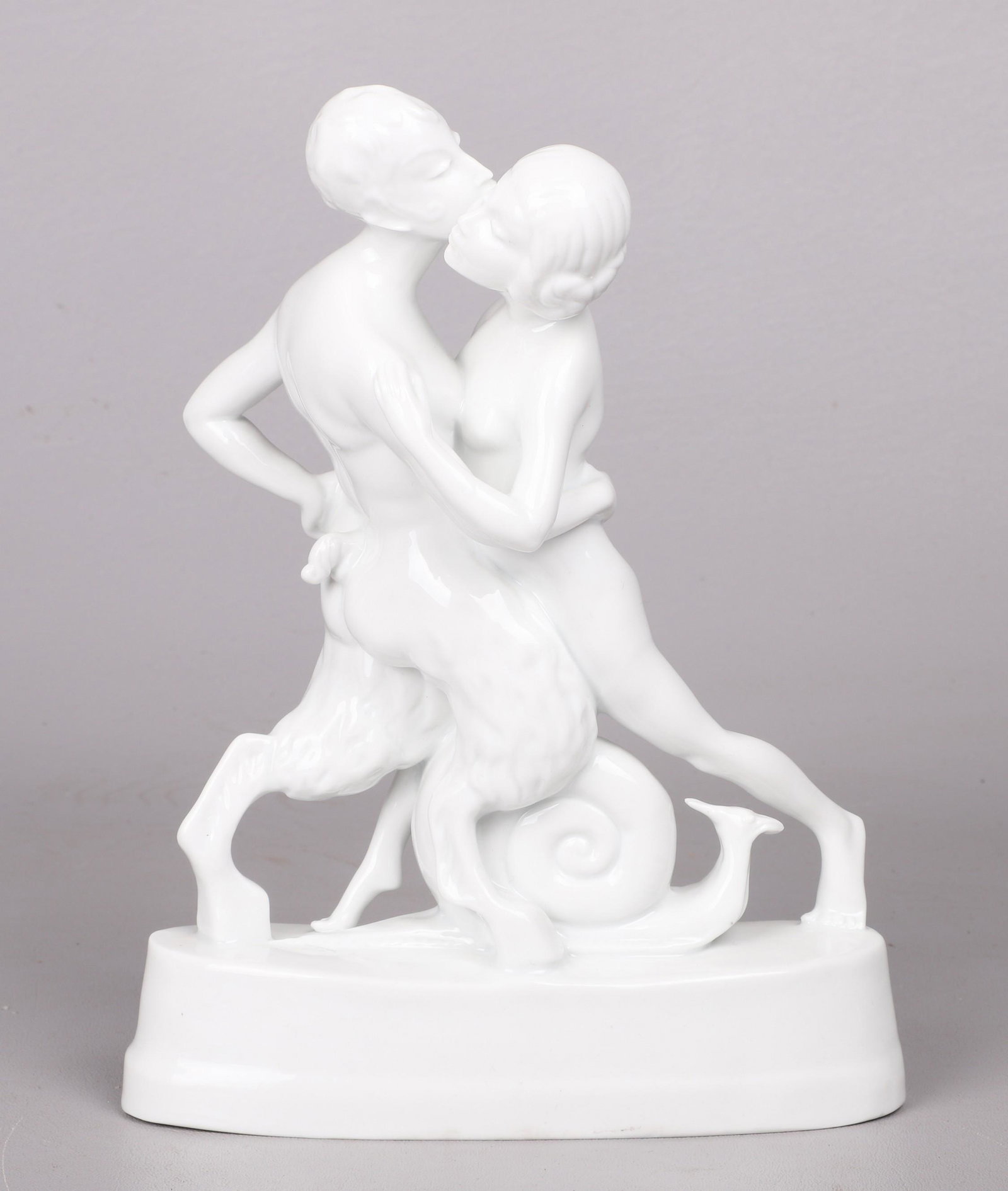 Fraureuth Kunstabteilung Porcelain Faun and Nymph: Fraureuth Kunstabteilung Porcelain Faun and Nymph, white glazed porcelain, dancing faun and nymph with snail, 9-1/2"H,7-1/4"W