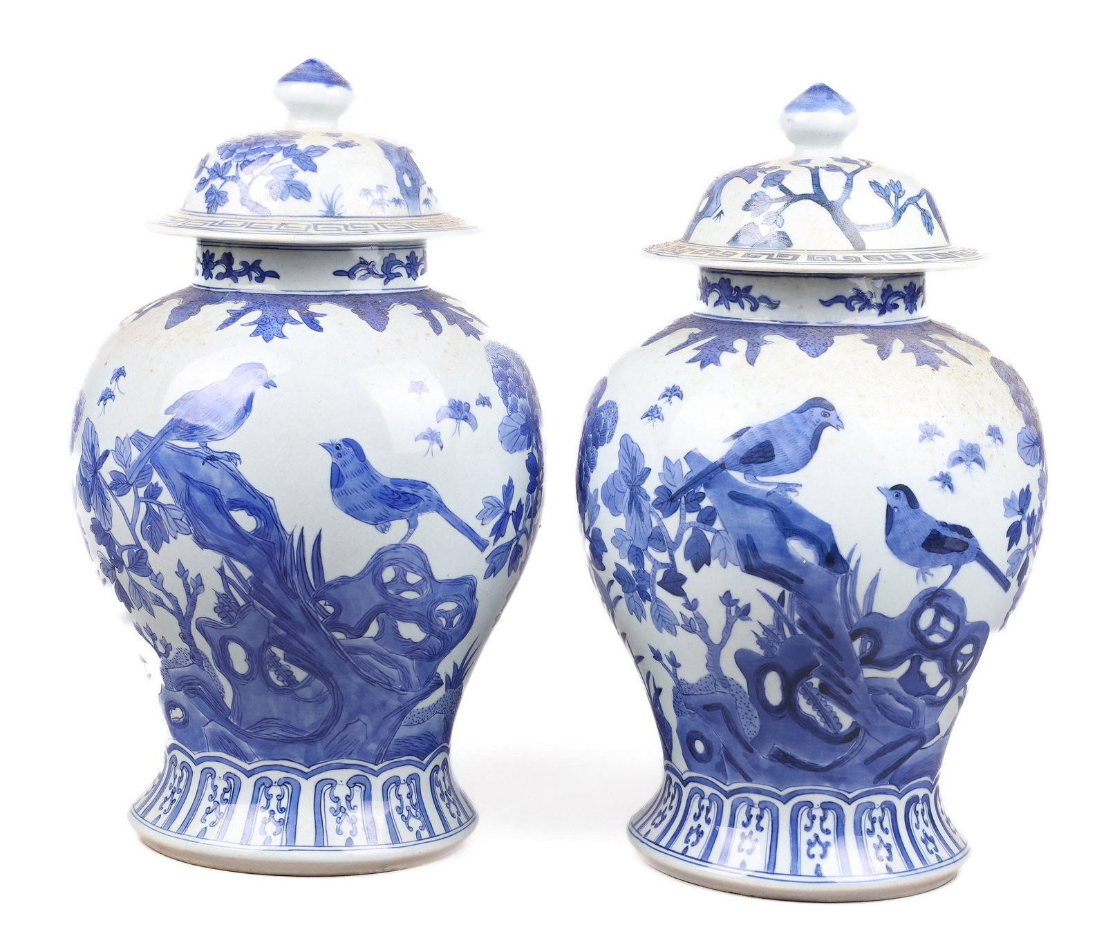 Pair of Chinese Blue & White Porcelain Covered Jars: Pair of Chinese blue & white porcelain covered jars, exotic bird & floral decoration, 4-character mark to base, United Pacific foil label, 16" h
