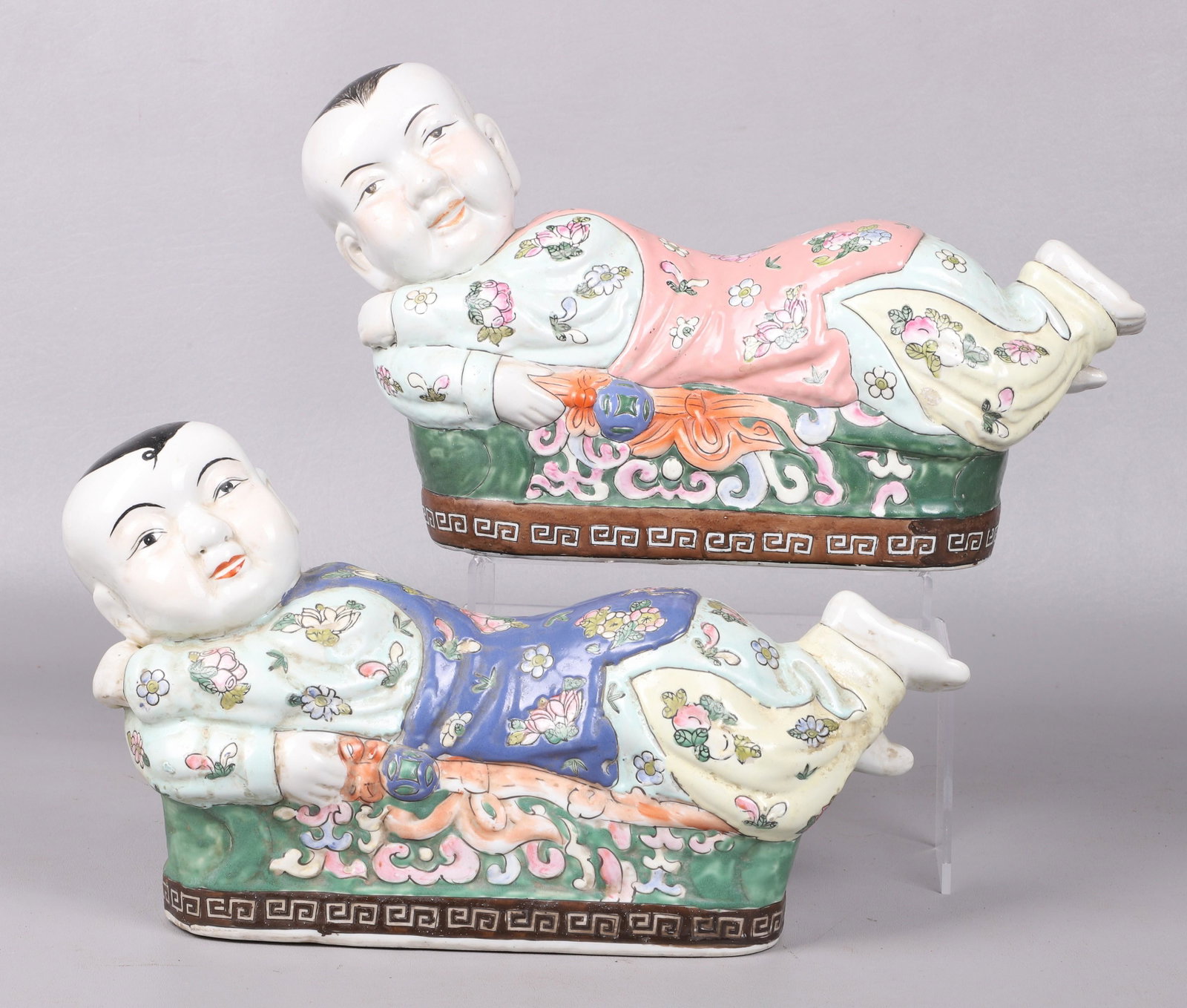 Pair of Chinese Porcelain Figural Pillows: Pair of Chinese porcelain figural pillows, 15-1/2" l x 8-1/2" h