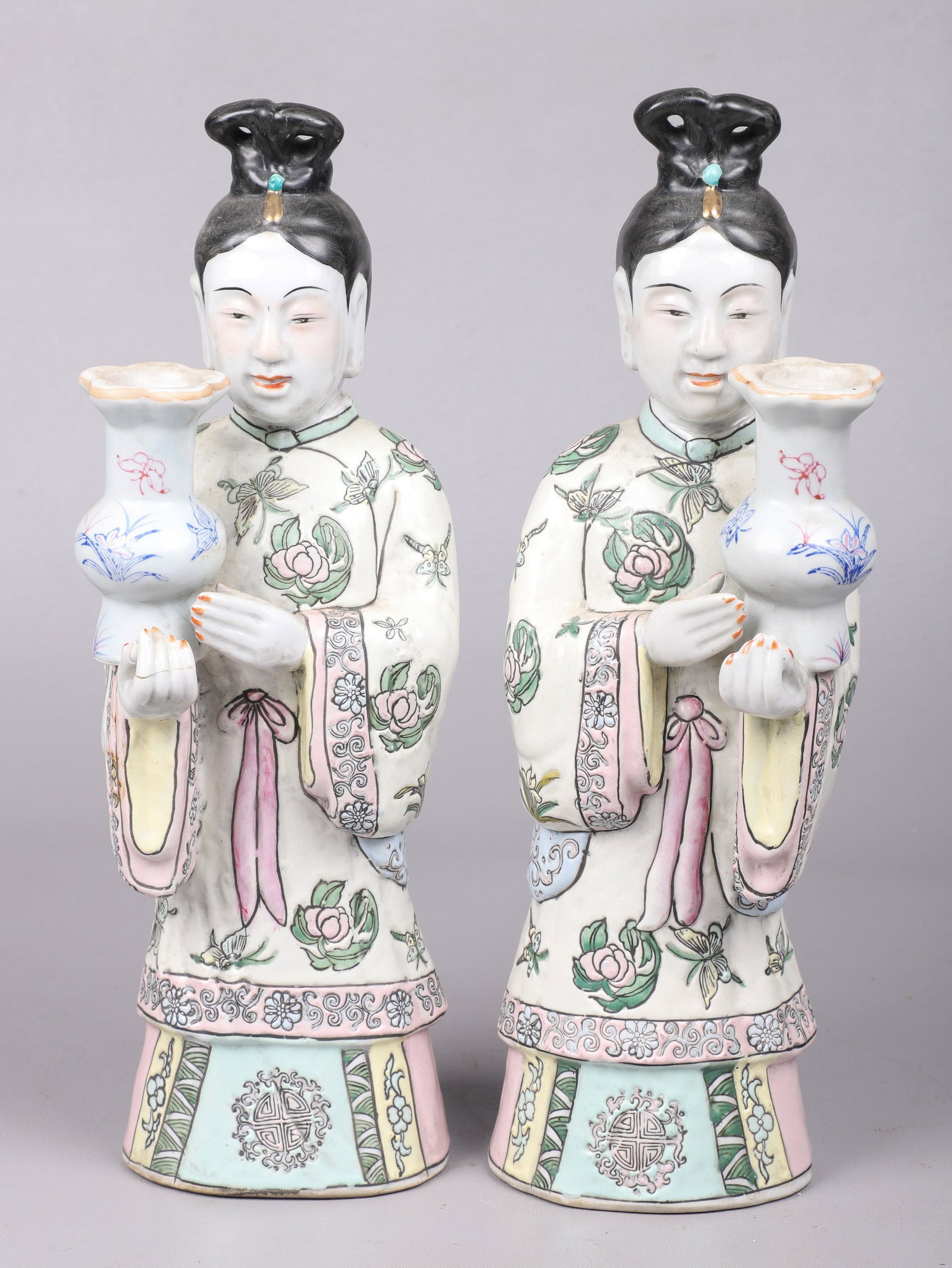 Pair of Chinese Porcelain Figures: Pair of Chinese porcelain figures, women with vase, made in Macau, mark to base, 13-1/2" h, one with repaired hand