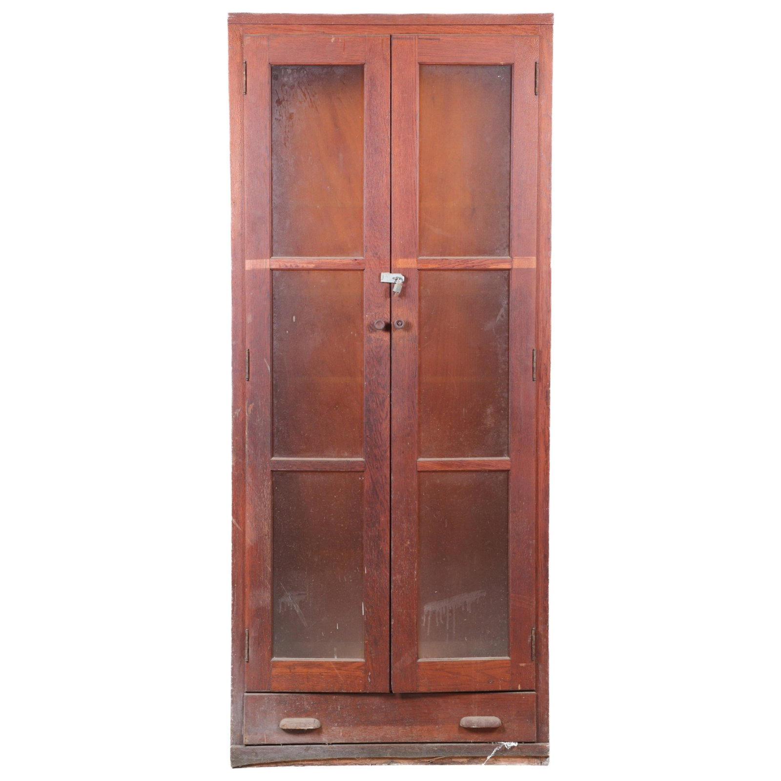 Oak paneled 2-door bookcase: Oak paneled 2-door bookcase, paneled glass doors, interior shelving, lower drawer, 84"h x 36"w x 18"d