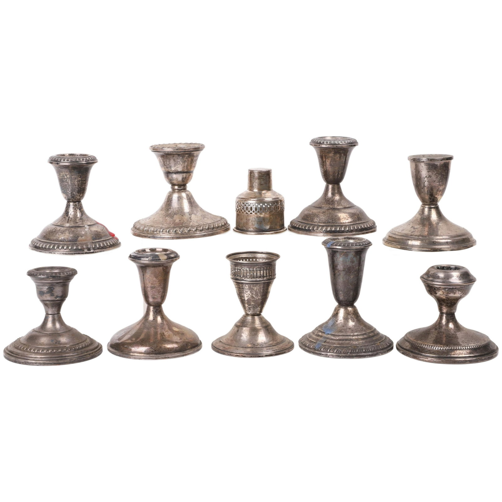 (9) Sterling Weighted Candlesticks: (9) Sterling weighted candlesticks, includes (1) pierced sterling bobeche.