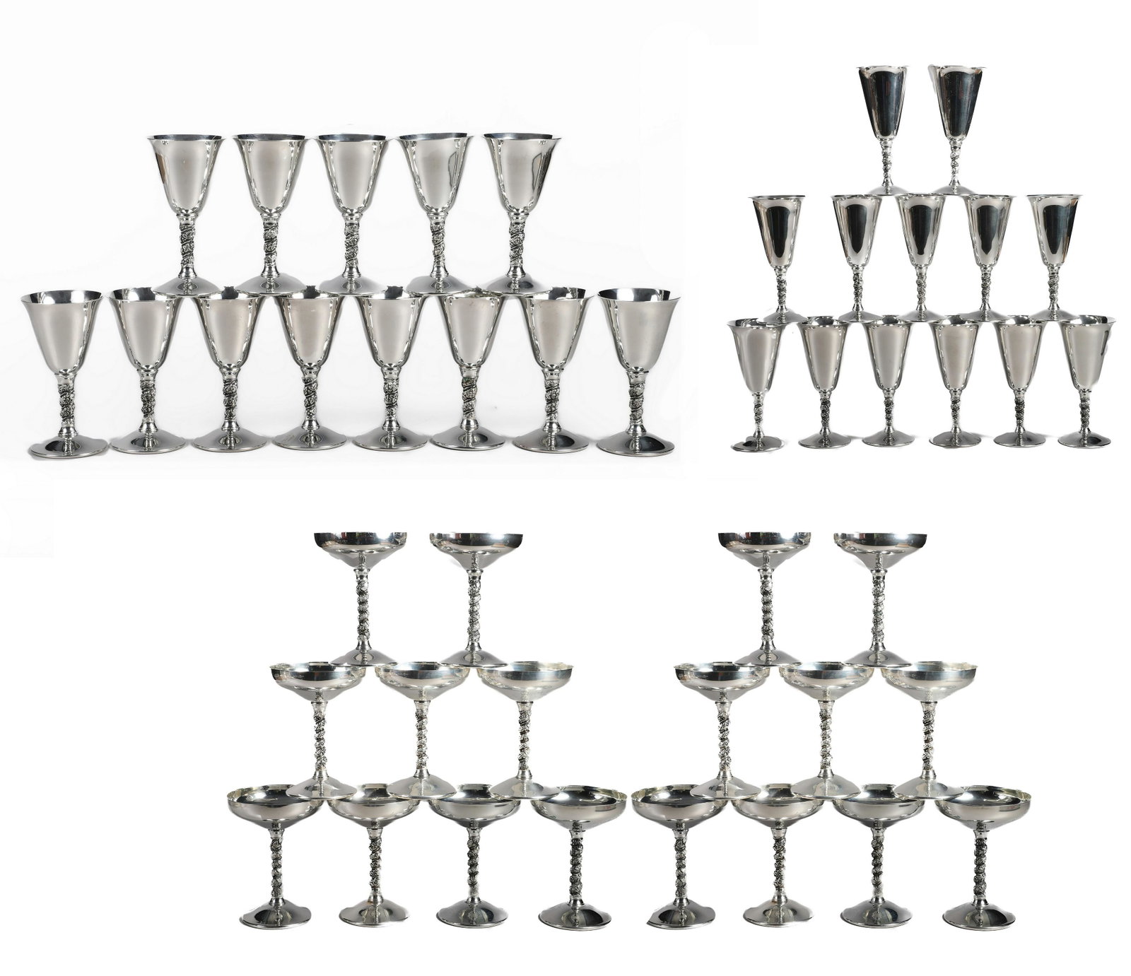 (44) Silverplate Twist Stem Goblets: (44) Silverplate twist stem goblets to include (18) coupes, 5-3/4"H, (13) wine goblets, 7"H and (13) cocktails, 5-1/4"H, on leaf and grape twist stem.