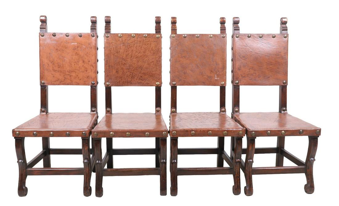 (4) South Cone carved leather dining chairs: (4) South Cone Baroque style carved leather dining chairs, scrolled top over tacked leather back and seat, scrolled footed stretcher, 4 side chairs, 47"h x 19"w x 19"d