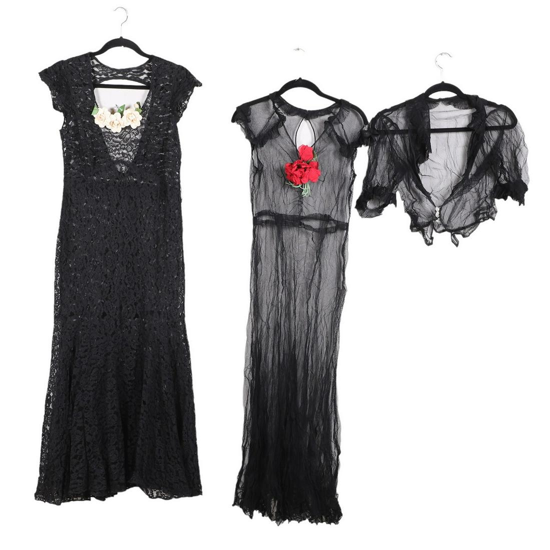 (2) Early 20th C Black Lace Dresses: (2) Early 20th c black lace dresses, draped black lace dress with white velvet floral adornment at bust, 36" bust, 34" waist, 38" hips, black net lace dress, pleated trim, 34" bust, 28" waist, small r