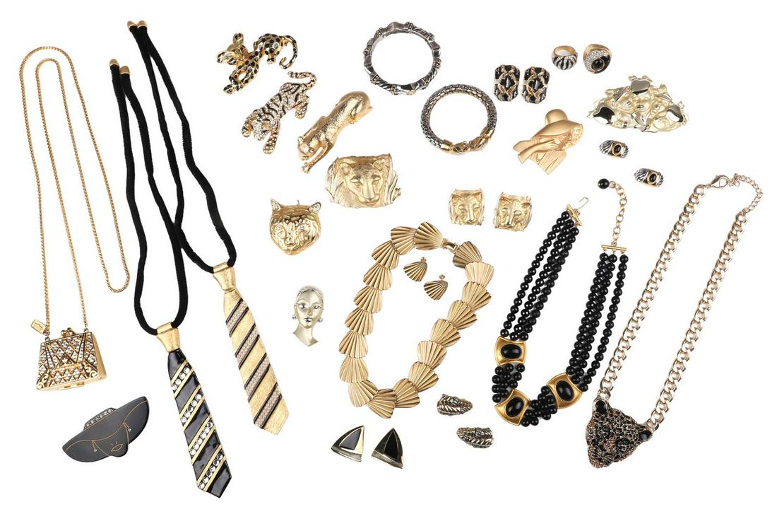 Gold Tone and Black Enameled Jewelry Group: Gold tone and black enameled jewelry group to include Park Lane jaguar brooch and earrings, (1) post with wiggle, mixed metal textured clip earrings, unsigned rhinestone and black enamel big cat brooc