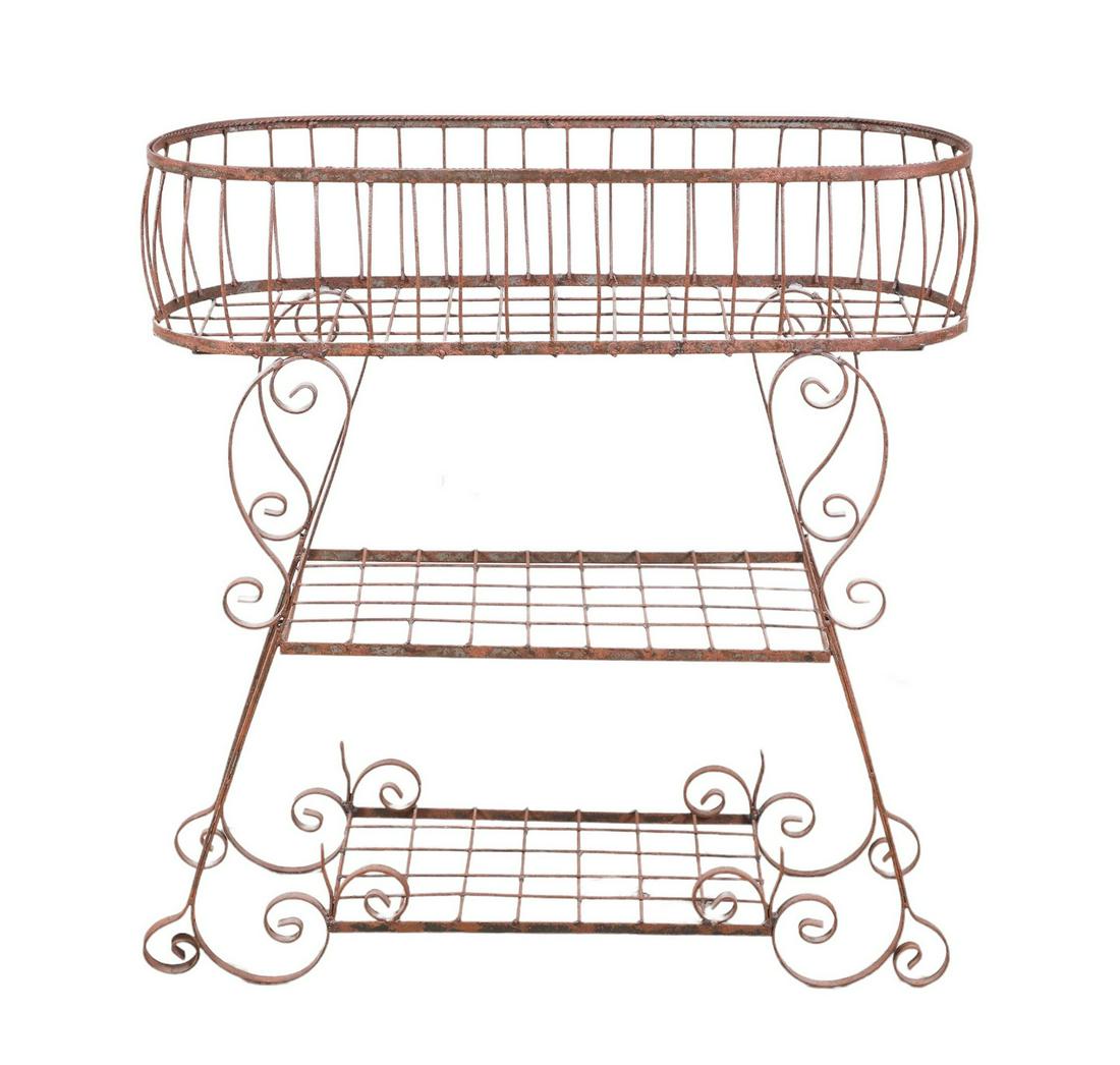 Salterini style scrolled metal tiered planter: Salterini style scrolled metal tiered planter, top with planter over 2 shelves, 33-1/2"h x 32"w x 11"d, surface rust