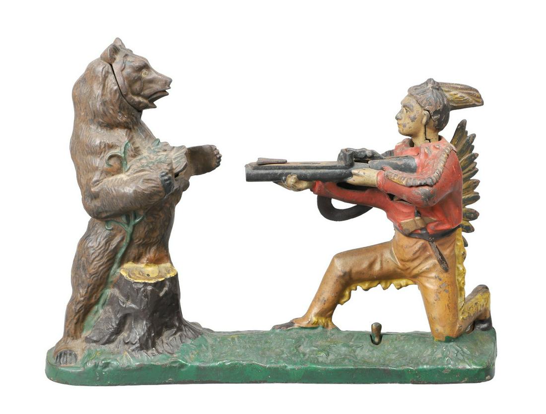 J&E Stevens Cast Iron Indian Shooting Bear Bank (1 of 4)