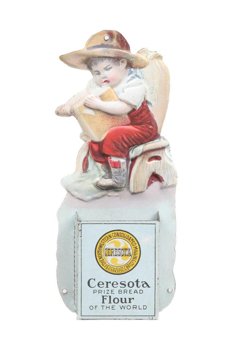 Tin Litho Ceresota Bread Flour Match Safe: Tin Litho Ceresota Bread Flour Match Safe, depicting a little boy on a chair playing in a bag of flour, 5-3/8"H, 2-1/4"W