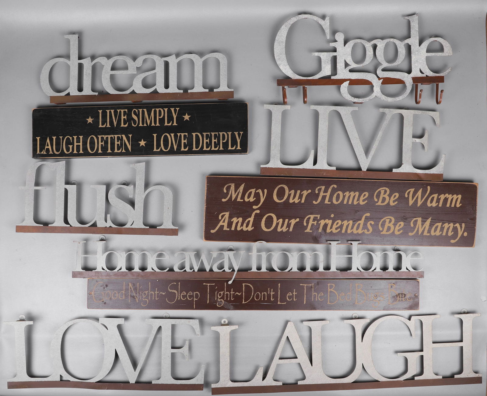 (10) Decorative Wall Hangings: (10) Decorative wall hangings, sayings include (7) metal cutouts )"Live", "Love", "Laugh", "flush", "dream", "Home Away From Home", "Giggle" with coat hooks), (3) painted wood ("Live Simply, Laugh Oft