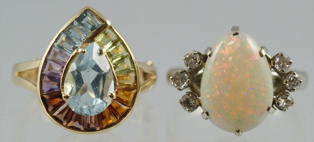 (2) 14K W&YG rings, teardrop shaped opal flanked: (2) 14K W&YG rings, teardrop shaped opal flanked by 6 small diamonds, size 5 3/4, teardrop blue zircon with baguette surround, size 6, 4.4 dwt gross wt