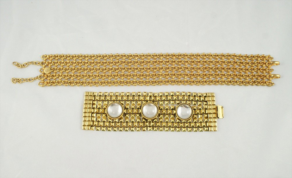 2 piece costume jewelry lot consisting of Domini: 2 piece costume jewelry lot consisting of Dominique Aurientis Paris gold tone multi link choker, 12.75"L and Marla Buck gold tone glass stone bracelet, 7"L