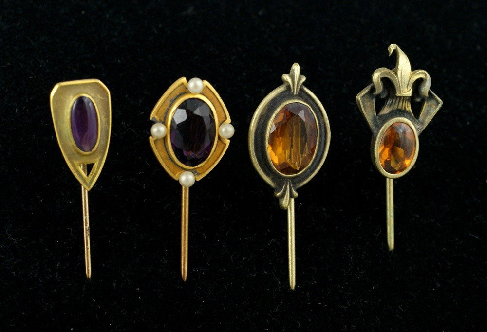 (4) YGF or other metal stickpins with amethyst c: (4) YGF or other metal stickpins with amethyst colored stones