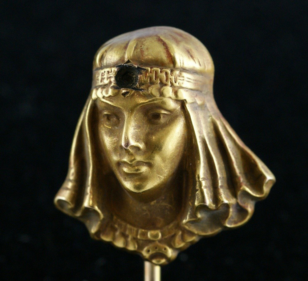 Unmarked YG stickpin, Egyptian ladies head, full: Unmarked YG stickpin, Egyptian ladies head, full front, missing stone from forehead, 1.6 dwt