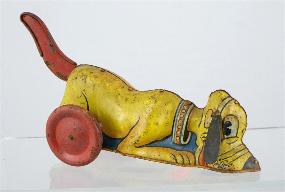 Marx Walt Disney Tin Pluto Dog, Copyright 1939, : Marx Walt Disney Tin Pluto Dog, Copyright 1939, 9-1/2" l, 5" h, light overall rust spots.