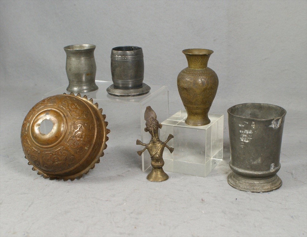6 Metal Objects, John W Tufts Boston Mass Miniat: 6 Metal Objects, John W Tufts Boston Mass Miniature pewter beaker, Half Pint Pewter cup with various marks & old repair, small pewter vessel with harp and other marks, and 1 brass vase, 1 brass figure