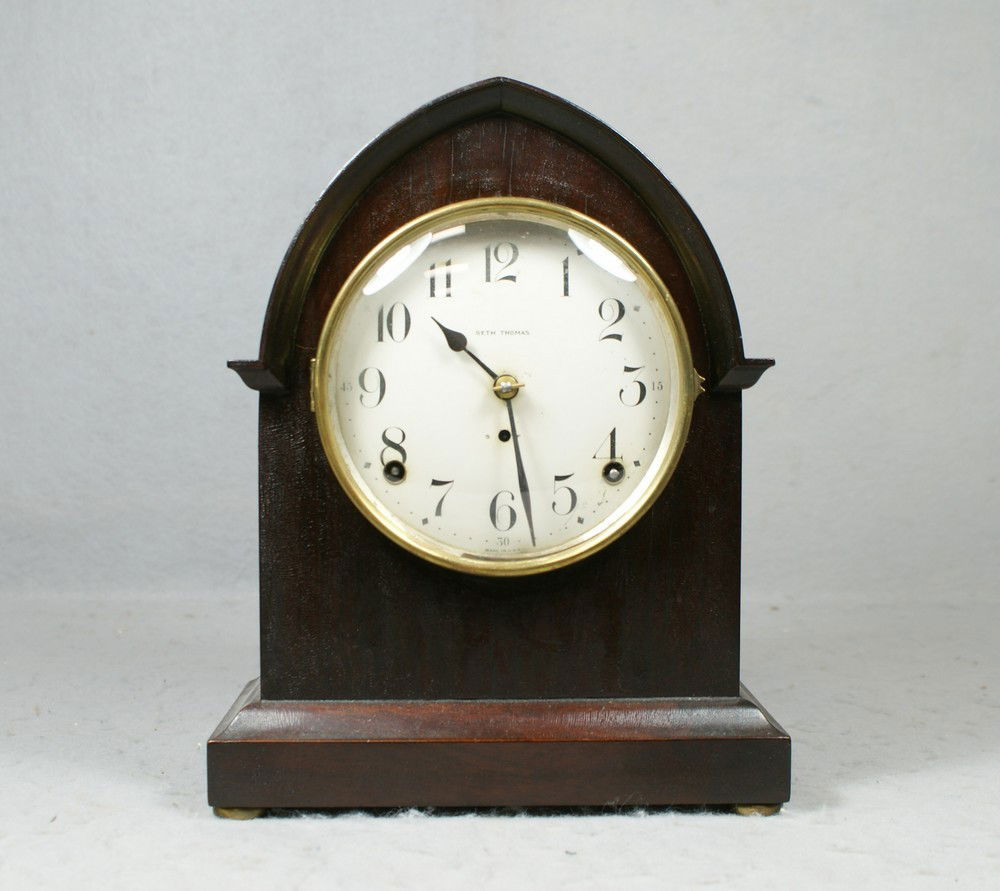 Seth Thomas mahogany Gothic arch mantle clock, h: Seth Thomas mahogany Gothic arch mantle clock, hour strike, runs when wound, 10 3/4" h