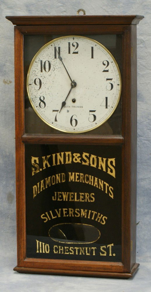 Seth Thomas advertising box regulator, S Kind a: Seth Thomas advertising box regulator, S Kind and Sons, Diamond Merchants, Jewelers, Silversmiths, 1110 Chestnut St, 31" h, flaking to the dial