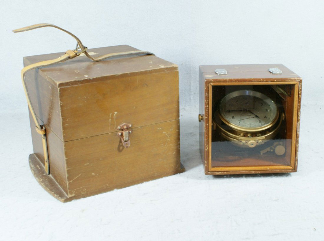 Ships chronometer by Thomas Mercer, St Albans, E: Ships chronometer by Thomas Mercer, St Albans, England, in a double mahogany case, SN 26246, with up-down wind indicator and original key, runs when wound, 4" dial, outer case 9 1/4" x 9 1/2", also si