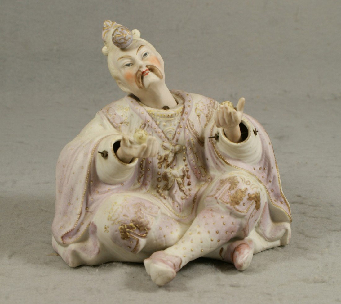 Japanese bisque nodder figurinf of man juggling: Japanese bisque nodder figurine of man juggling balls, 6 1/2" tall