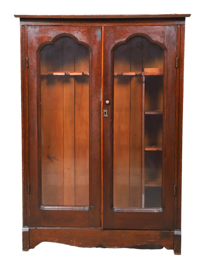 Larkin mahogany 2-door bookcase: Larkin mahogany 2-door bookcase, two glass doors, fitted gun cabinet interior, 54"h x 38"w x 12"d