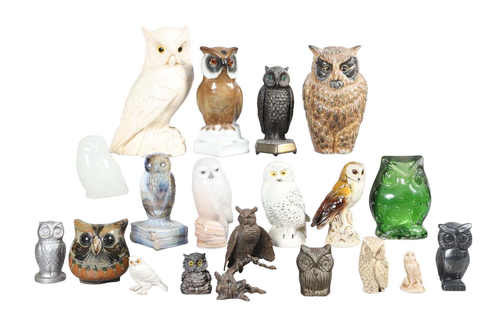 Lot of Owl Figures: Lot of owl figurines, including Lindstrand Kosta crystal, Goebel porcelain, Avon bronze, Degenhart slag glass, Mexican pottery, Denmark porcelain, Wade, pewter, stone
